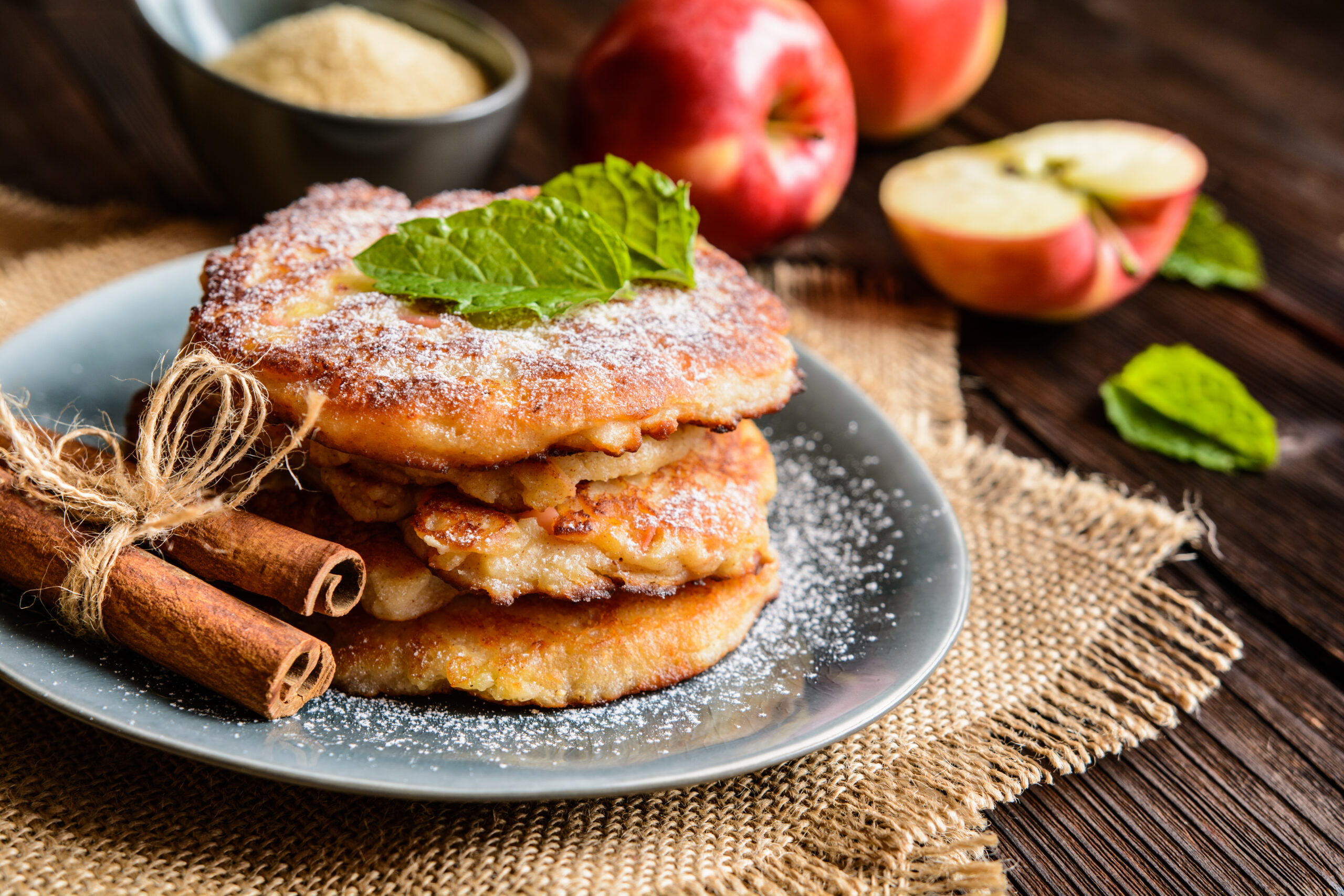 Sweet pancakes made of apple, curd and cinnamon