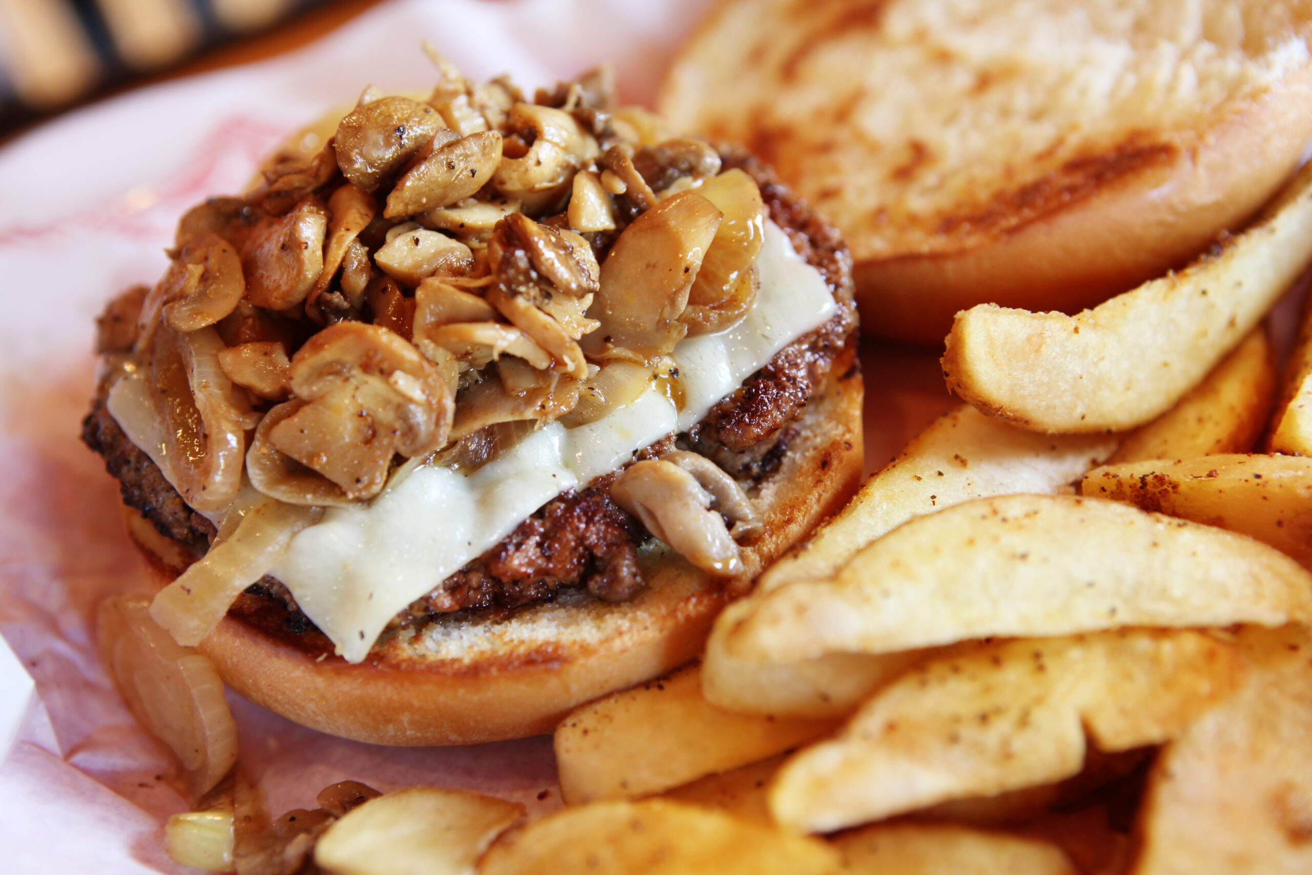 meat hamburger with Swiss cheese and potato wedges..More FOOD And Table Setting images: